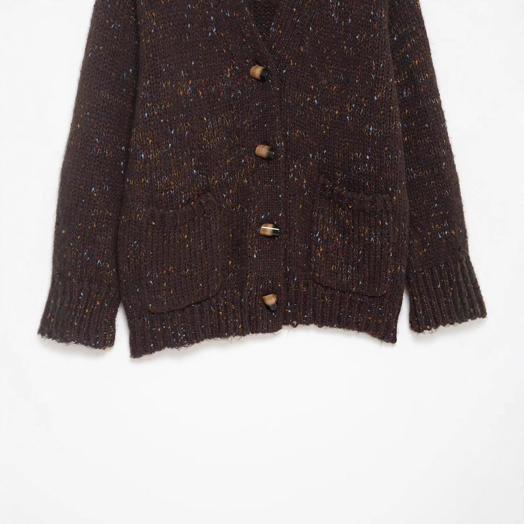 Women’s chunky knit cardigan with horn button front and patch pockets Mune Fashion