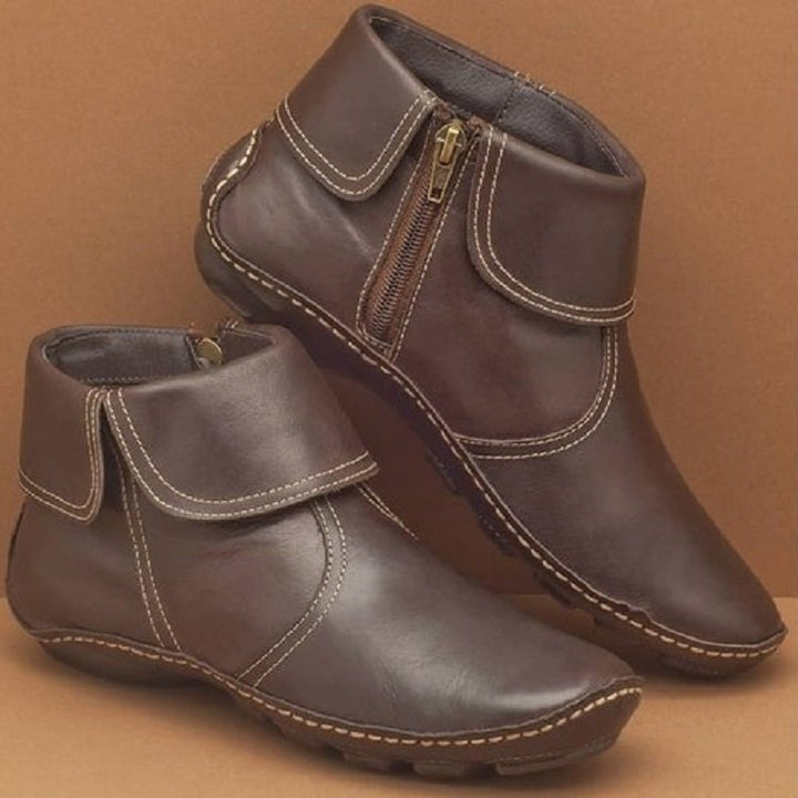 Women's soft leather booties with foldable strap, side zipper and flexible tread sole Mune Fashion