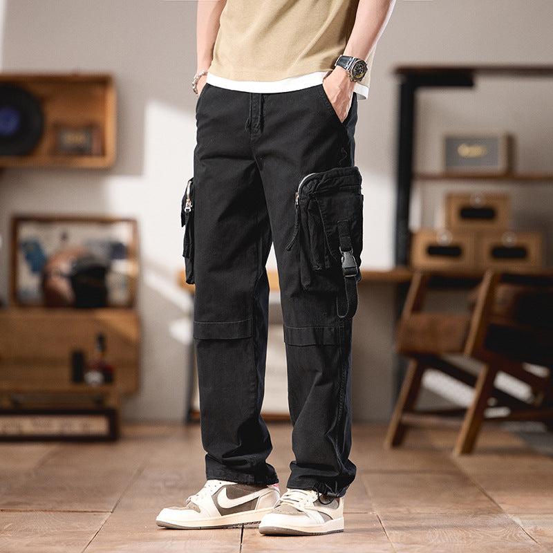 Men's multifunctional cargo pants in utility style with large flap and zip pockets, drawstring closure, and sturdy twill Mune Fashion