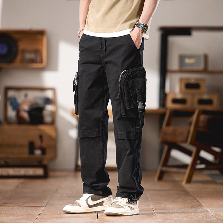 Men's multifunctional cargo pants in utility style with large flap and zip pockets, drawstring closure, and sturdy twill Mune Fashion