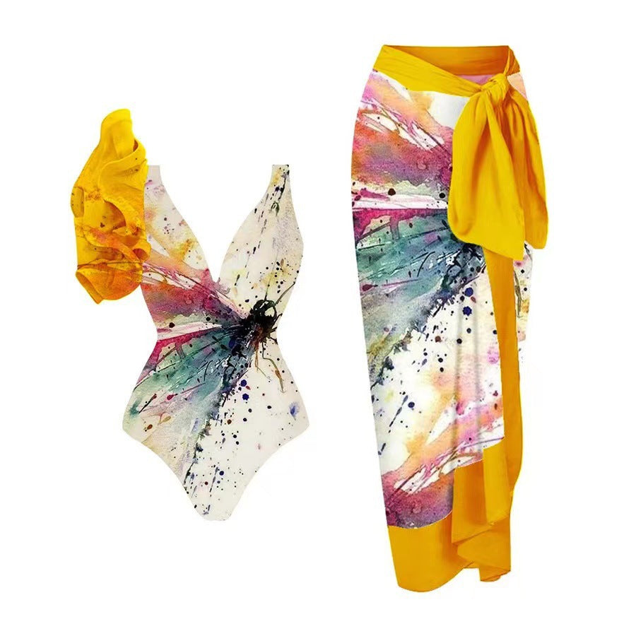 Women's swimsuit with voluminous ruffle details and matching wrap skirt Mune Fashion