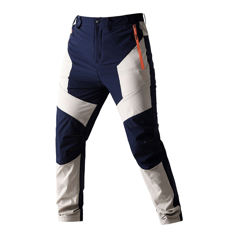 Men's functional trekking pants with reinforced knees, elastic waistband, and zipper pockets.