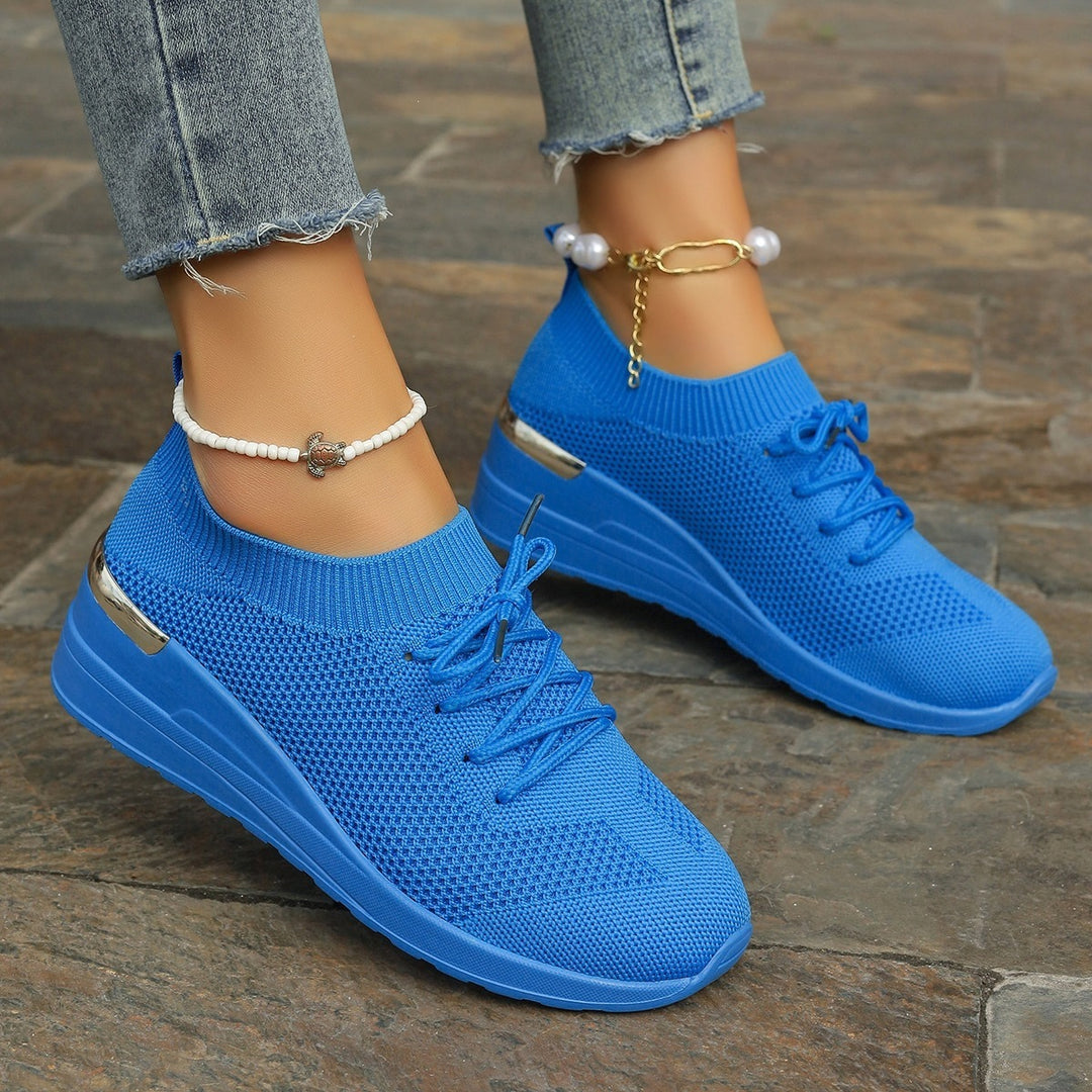 Women’s knit sneakers with wedge sole, sock-like shaft and metallic heel accent Mune Fashion