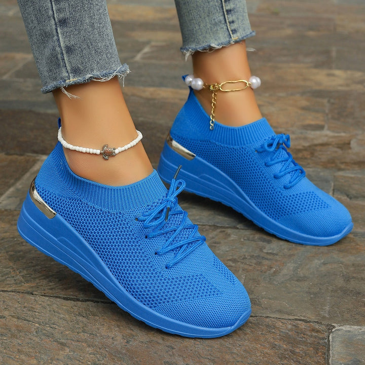 Women’s knit sneakers with wedge sole, sock-like shaft and metallic heel accent Mune Fashion