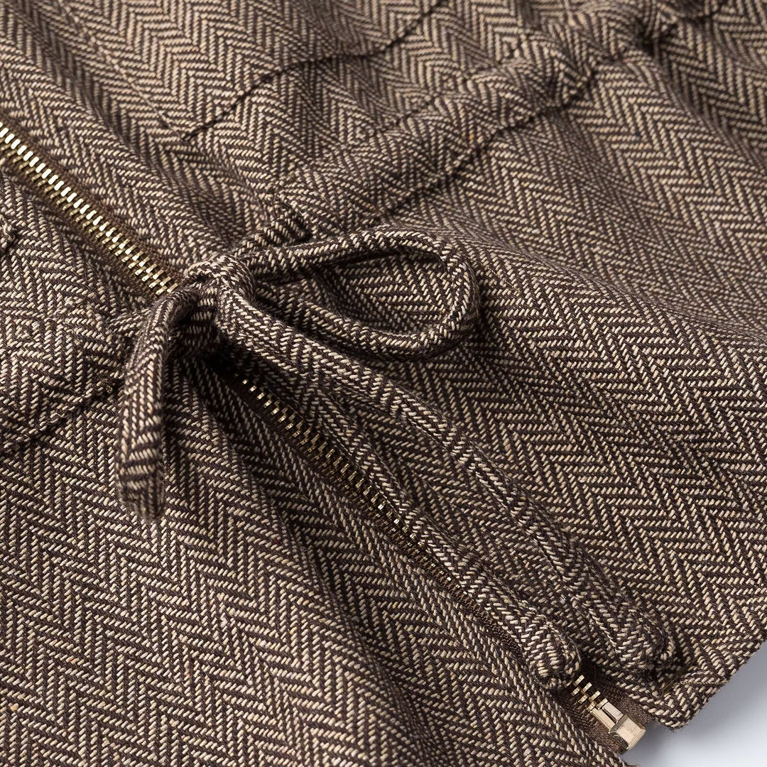 Women's short-sleeved tailored transition jacket with zipper, drawstring, and patch chest pockets Mune Fashion