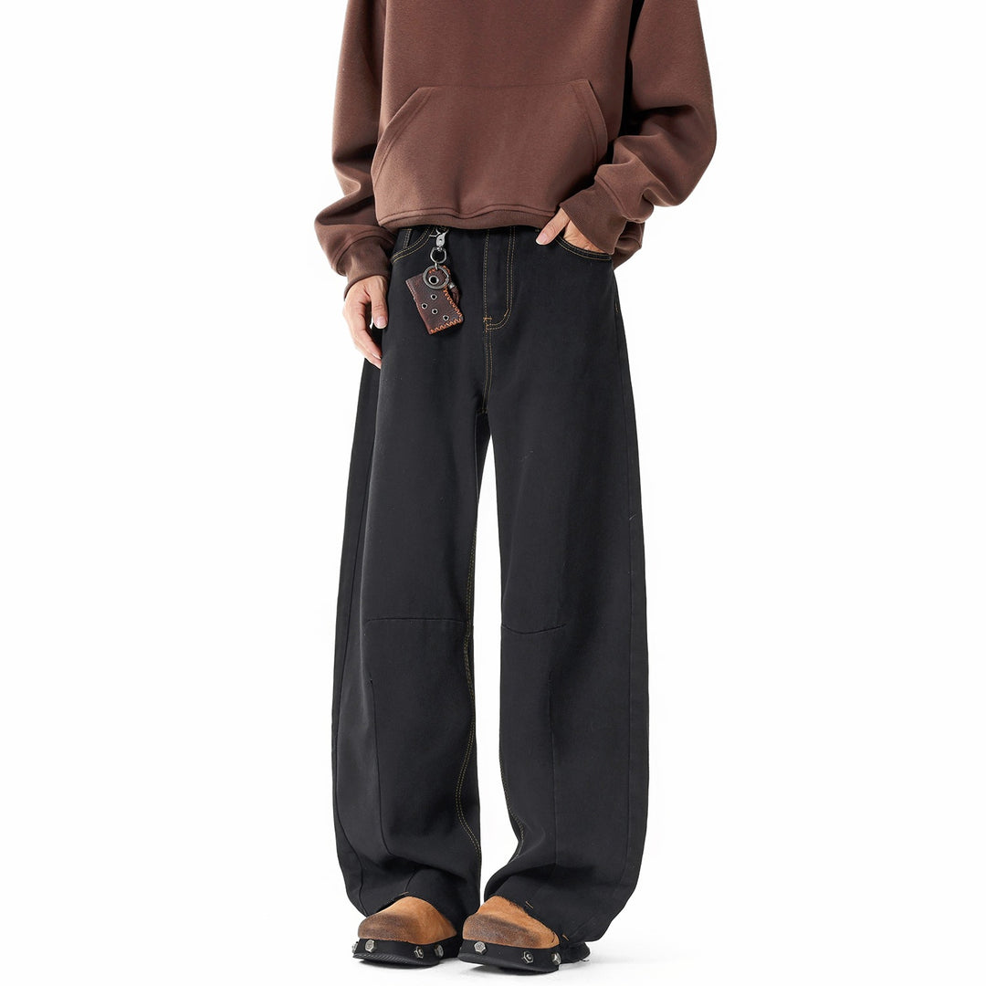 Men's wide-cut baggy jeans with high rise, knee darts, and distressed wash Mune Fashion