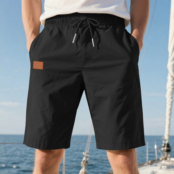 Men's quick-drying swim shorts in Bermuda cut with elastic waistband and drawstring Mune Fashion