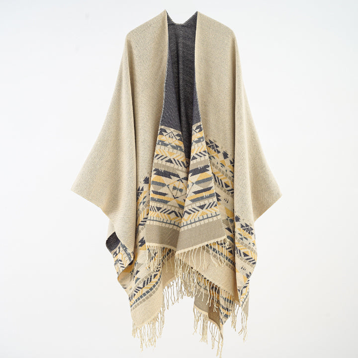 Women's Oversize Poncho made of wool blend with jacquard border and fringe hem Mune Fashion