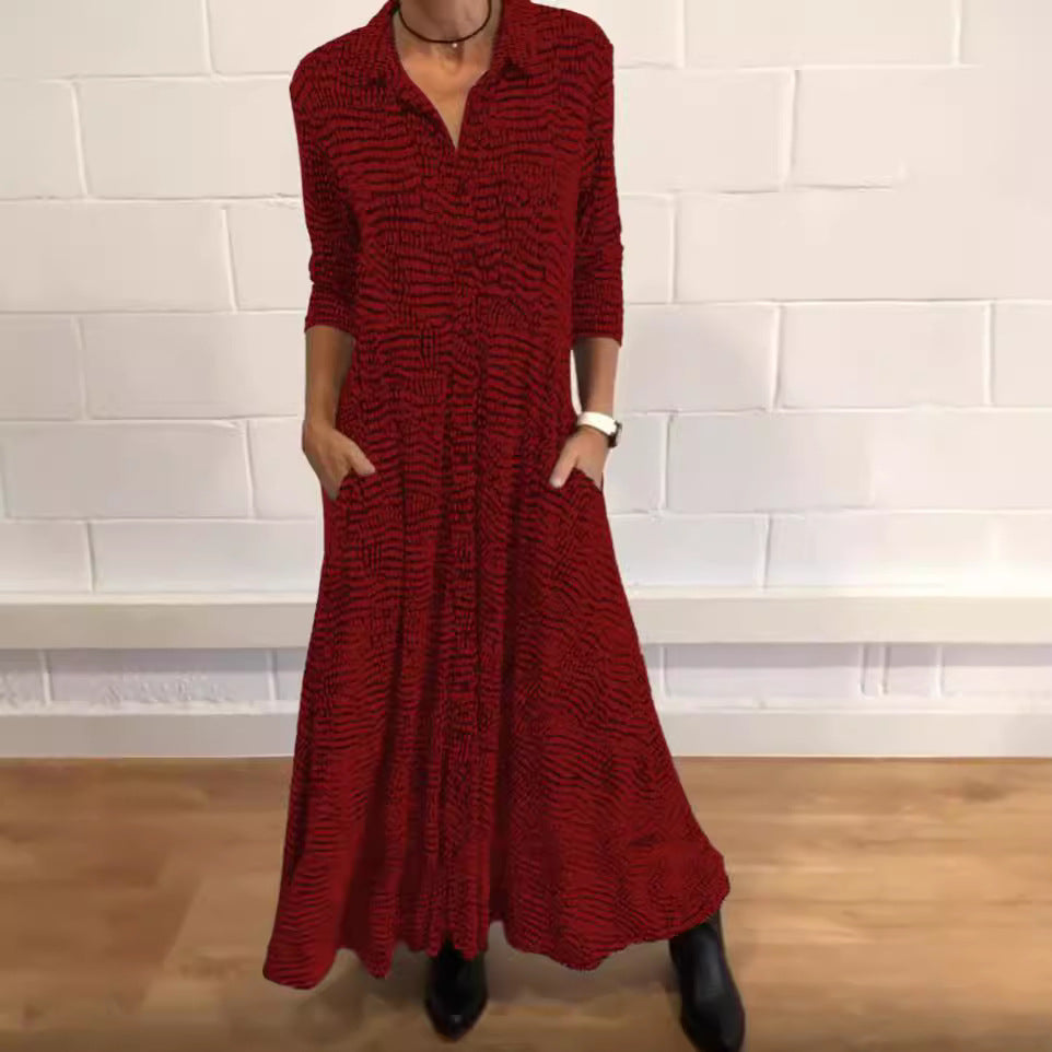 Women's flowing maxi dress with shirt collar, V-neck, three-quarter sleeves, and side pockets Mune Fashion