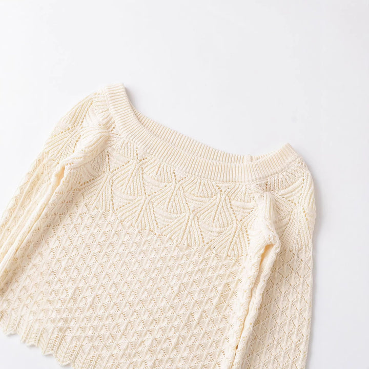 Women's crocheted short sweater with wide boat neckline, fine lace knit pattern and elastic cuff Mune Fashion
