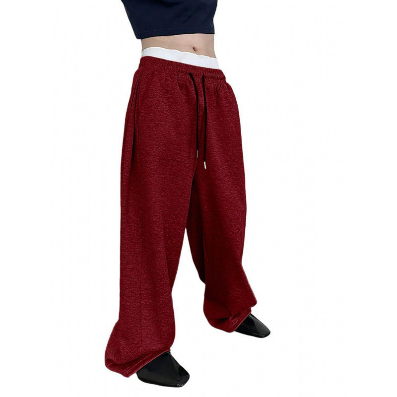 Women's wide oversize jogging pants with a deep crotch, elastic waistband, and drawstring Mune Fashion