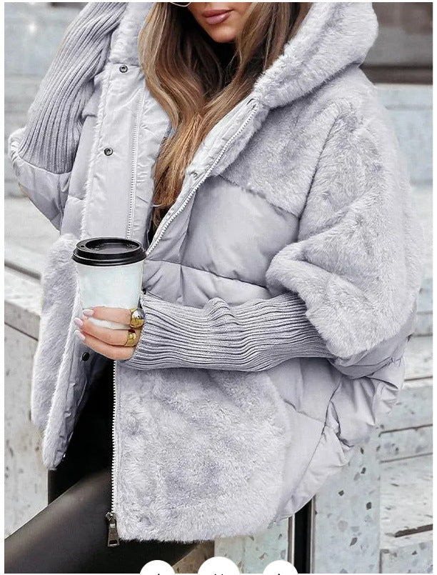 Women's oversized quilted winter jacket with faux fur panels, hood and integrated ribbed sleeve details Mune Fashion