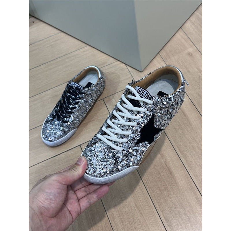 Women's glitter sneakers with sequin trim, star appliqué and contrasting laces Mune Fashion