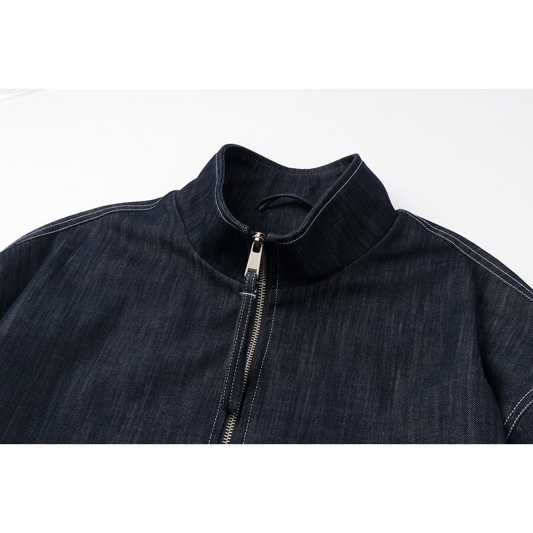 Men's Boxy Denim Blouson with high stand-up collar, visible contrast stitching and elastic hem.