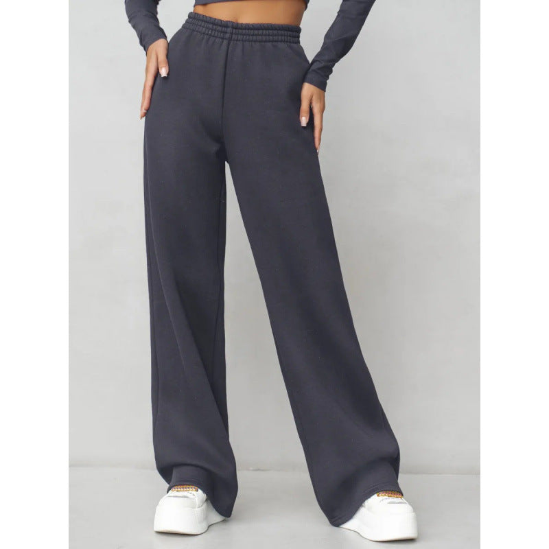 Women's flowing palazzo lounge pants with extra wide leg, elastic comfort waistband, and discreet side pockets Mune Fashion