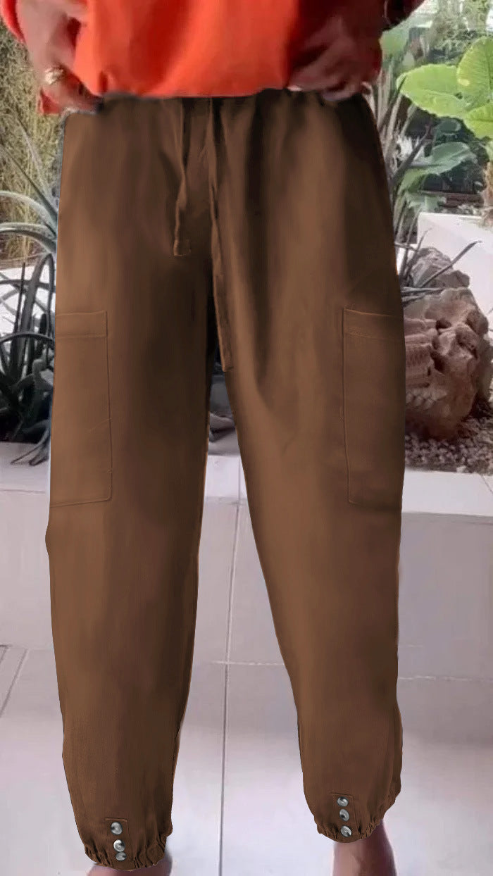 Ladies cargo jogging pants with drawstring, patch pockets and button cuffs Mune Fashion