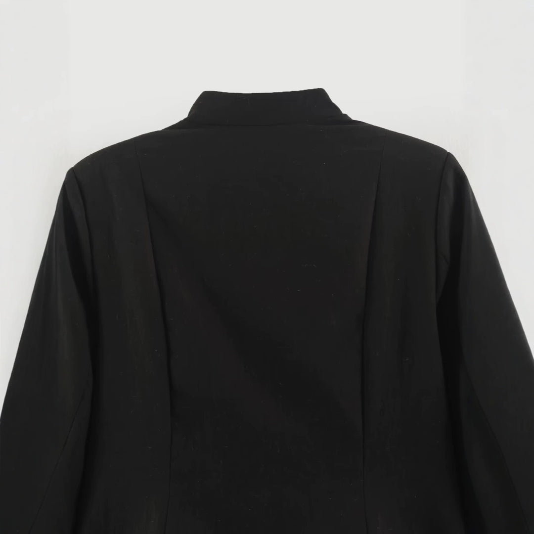 Women's short jacket in chinoiserie style with stand-up collar and knot button closure Mune Fashion