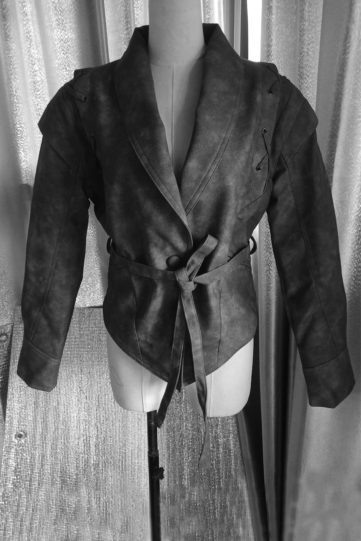 Women's tailored faux leather blazer with shawl collar, lacing details on the shoulder, and tie belt Mune Fashion