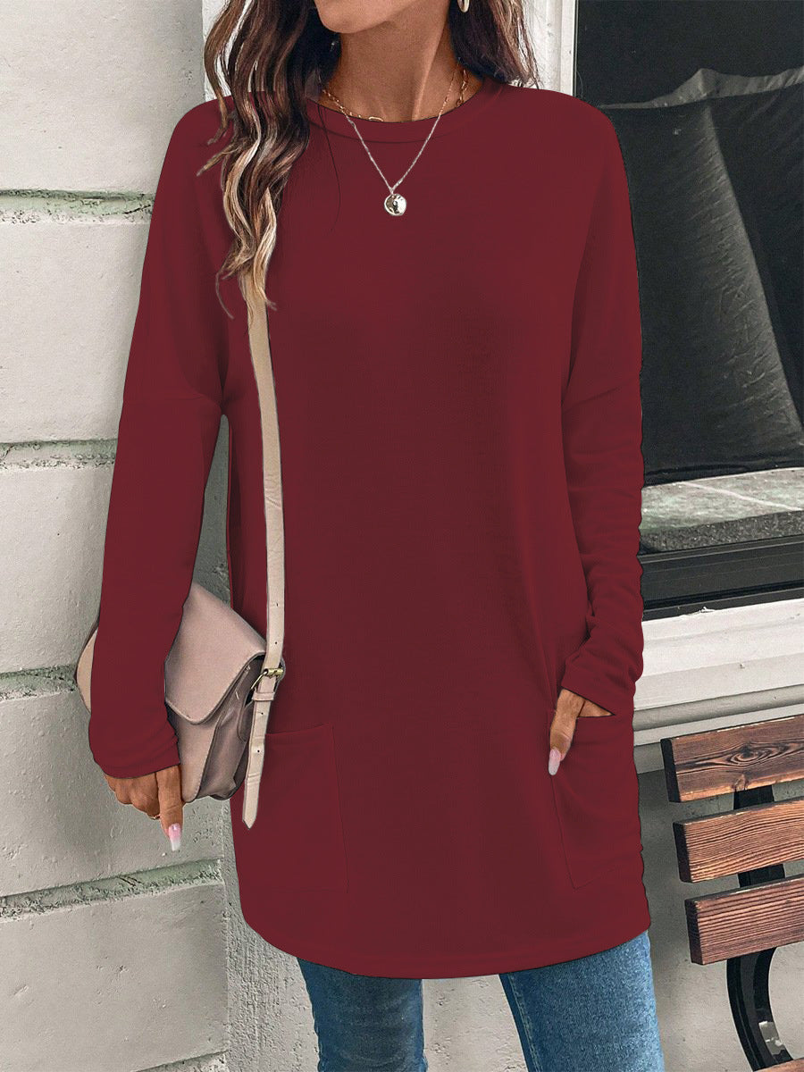 Women's loosely cut long tunic with round neckline, side pockets, and soft jersey Mune Fashion
