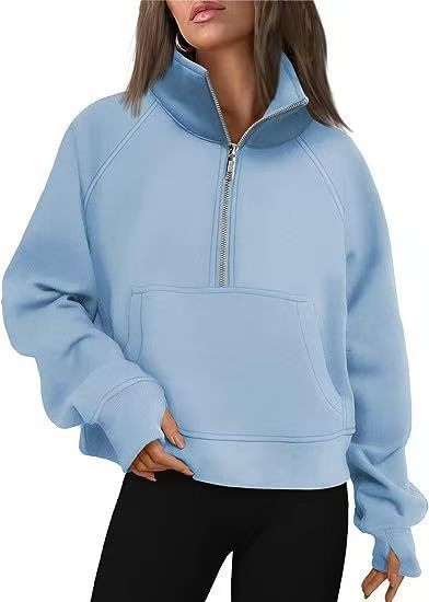Women’s oversized half-zip sweater with kangaroo pocket, thumb holes, and high collar Mune Fashion