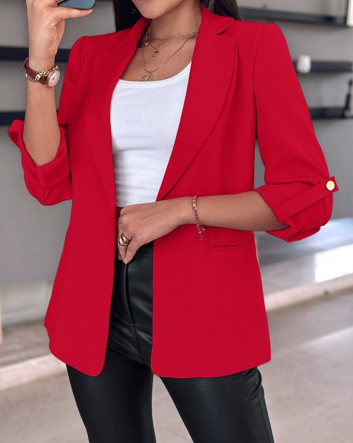 Women's tailored long blazer with lapel, rolled-up sleeves, and hidden side pockets Mune Fashion