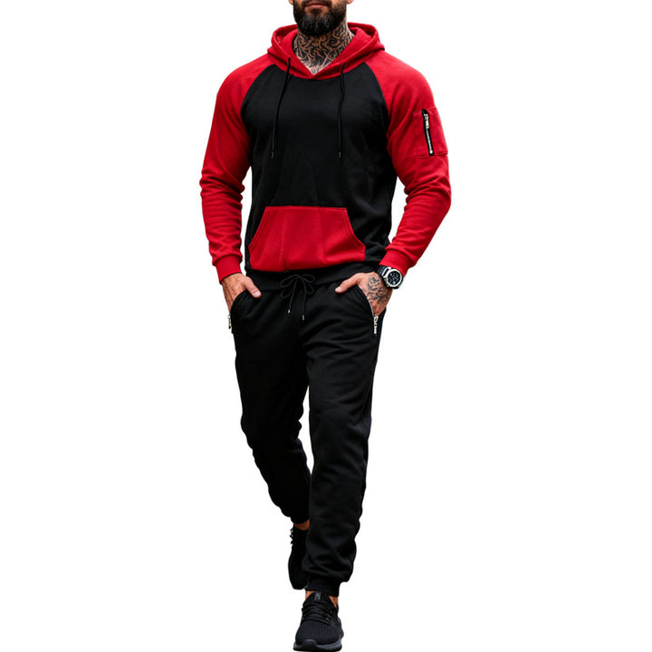 Men's two-piece hooded sweat set with raglan sleeves, sleeve zip pocket, and tapered jogging pants Mune Fashion