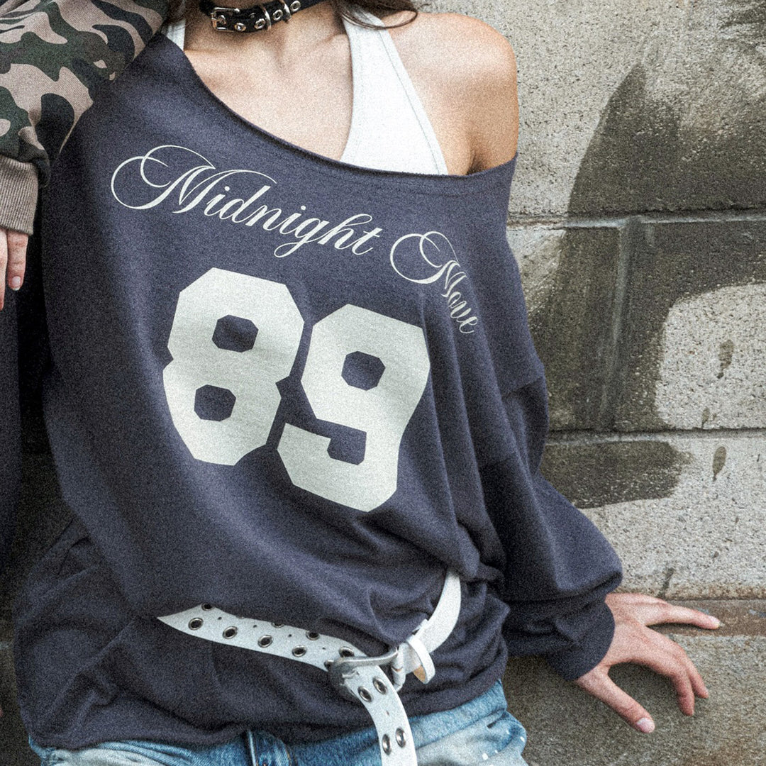 Women's oversized sweatshirt in off-shoulder style with vintage front print and flared hem Mune Fashion