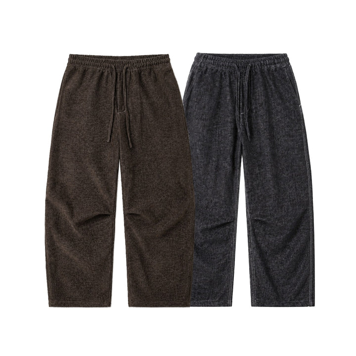 Women's loosely cut cropped pants with high elastic waistband and drawstring made of textured linen blend Mune Fashion