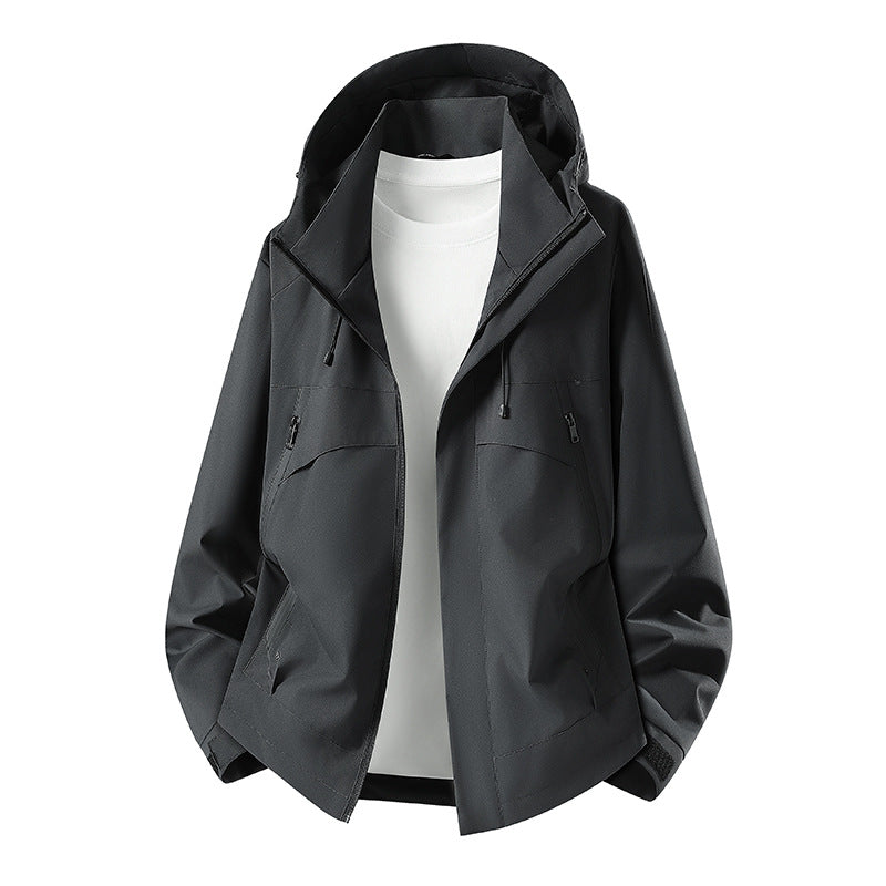 Women's lightweight waterproof hooded jacket with breathable coating, zippered pockets, and adjustable cuffs Mune Fashion