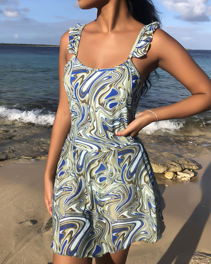 Women's one-piece swimsuit with playful ruffle design and abstract pattern Mune Fashion