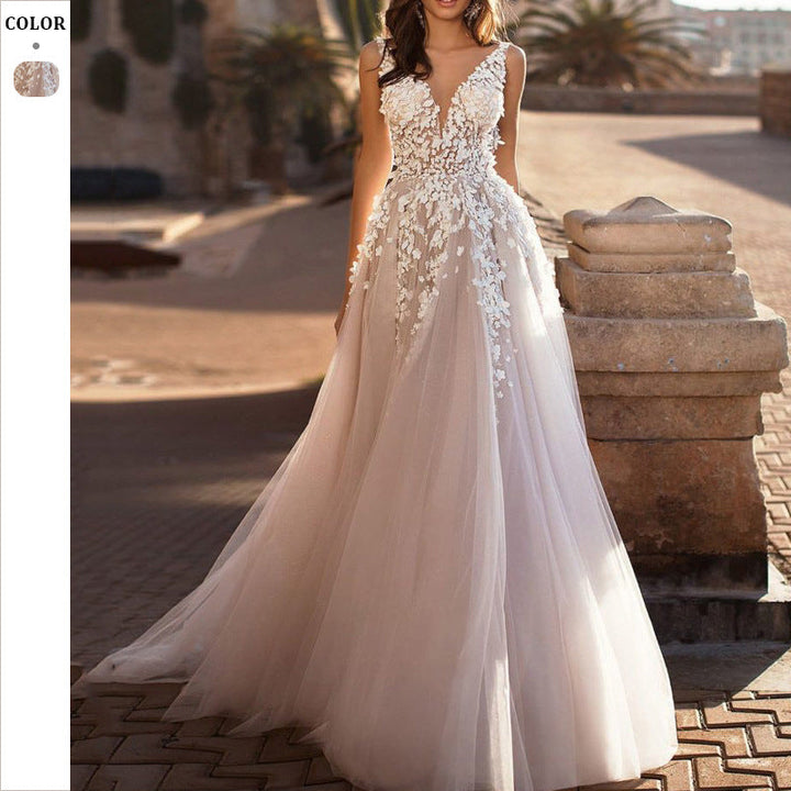 Festive Women's Wedding Dress with Floral Appliqués and Shimmering Tulle for Weddings | Mune Fashion