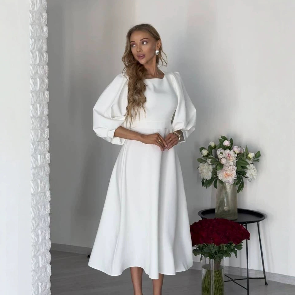 Women's midi dress with open back cutout, voluminous puff sleeves and tie belt Mune Fashion
