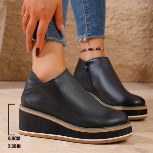 Women's Mune Fashion ankle boot with wedge heel, side zipper, and padded comfort insole