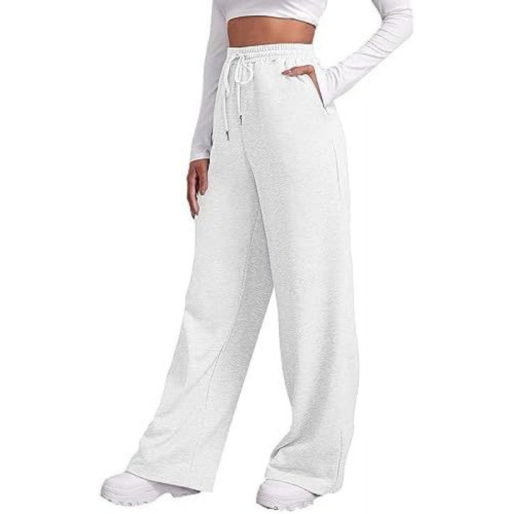Women's flowing high-waist palazzo lounge pants made of lightweight jersey with elastic waistband and practical side pockets Mune Fashion