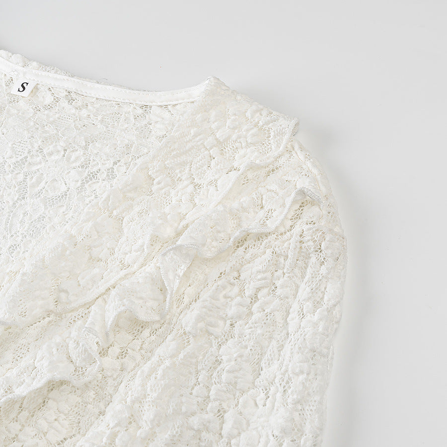 Ladies figure-hugging lace blouse with ruffle V-neck and tie detail Mune Fashion