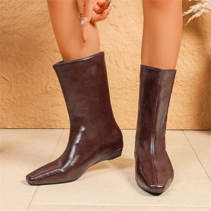 Women mid-cut suede boots with pointed toe shape and flat wedge sole Mune Fashion