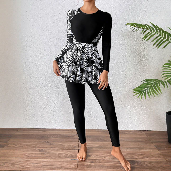 Damen Sportlicher Langarm Badeanzug mit Rüschendetails Echo Archiv