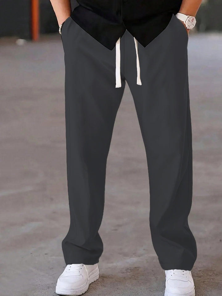 Men's loosely cut leisure pants with drawstring waistband and straight leg Mune Fashion