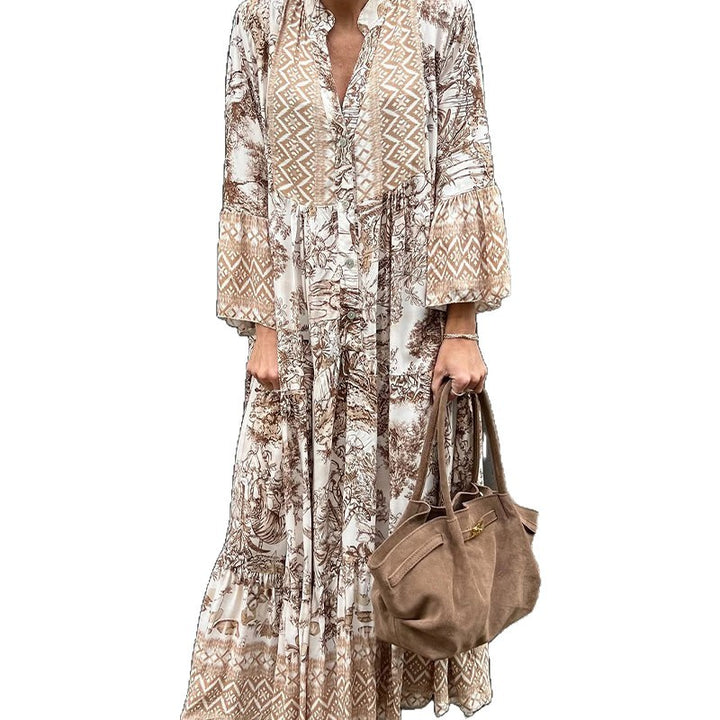 Ladies' tiered maxi dress with ethnic border, stand-up collar, and wide bell sleeves Mune Fashion