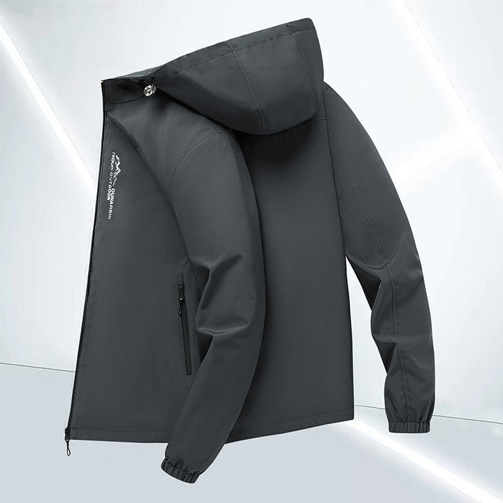 Men's windproof softshell jacket with adjustable hood, water-repellent membrane, and secure zip pockets Mune Fashion