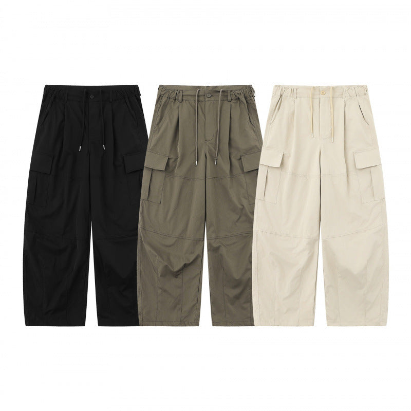 Men's loose-fitting cargo pants with high waistband, drawstring, and patch flap pockets Mune Fashion