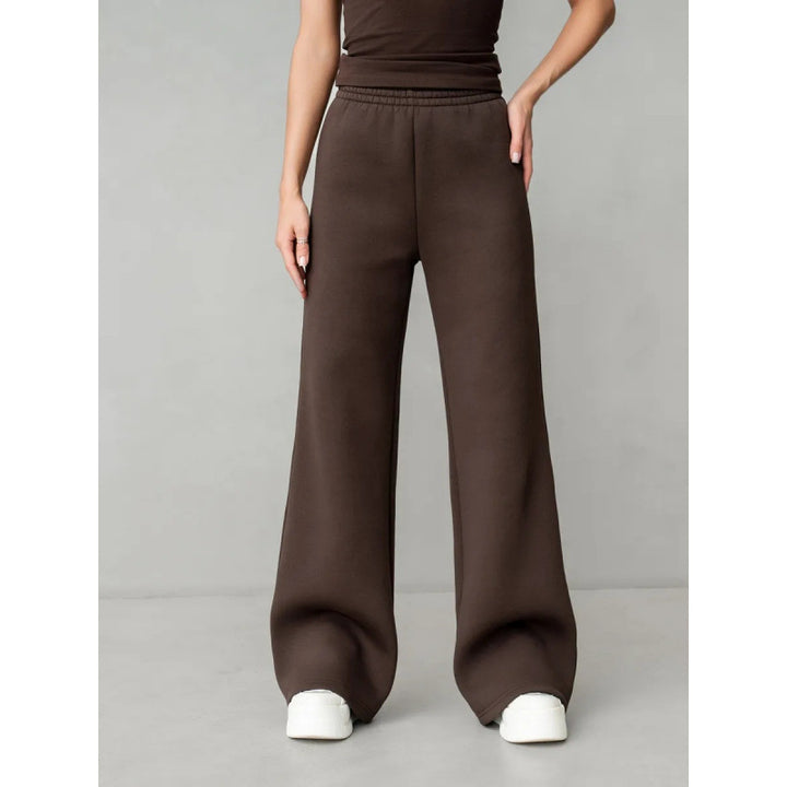 Women's flowing palazzo lounge pants with extra wide leg, elastic comfort waistband, and discreet side pockets Mune Fashion