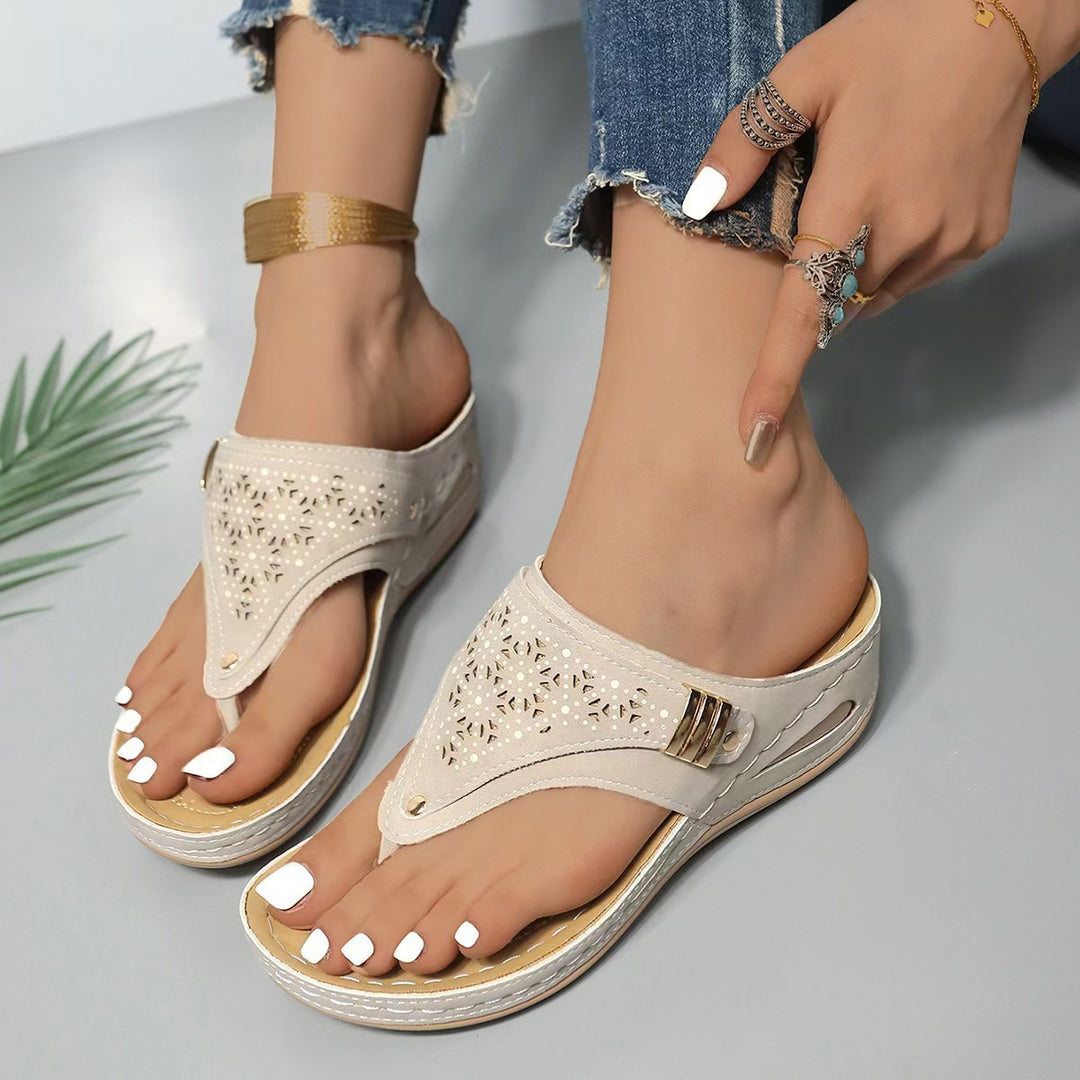 Women's comfortable thong sandal with ergonomic comfort footbed and decorative perforation Mune Fashion