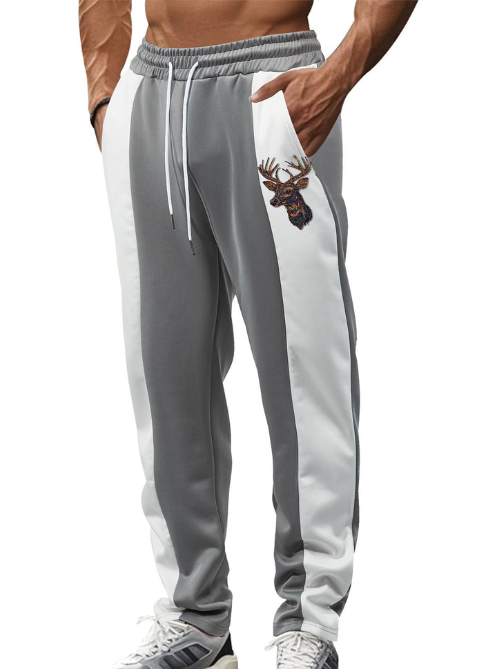 Men's sporty track pants with side contrast stripes, elastic waistband, drawstring, and deer embroidery Mune Fashion