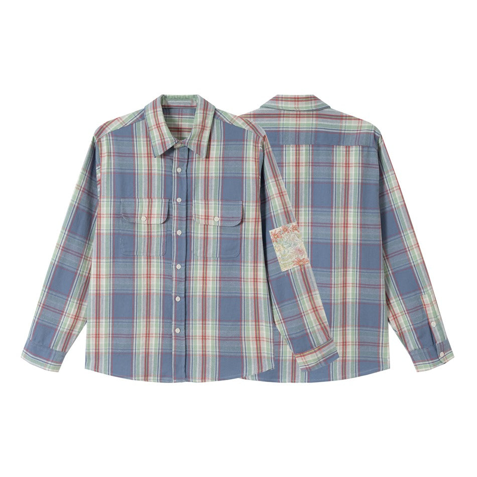 Unisex check shirt jacket in oversized cut with flap pockets and sleeve patch Mune Fashion
