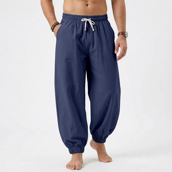 Men's relaxed harem pants made of linen blend with elastic drawstring waistband and gathered ankle closures Mune Fashion