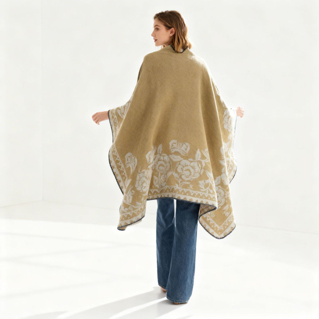 Women's poncho with floral jacquard structure and fine overlock seam Mune Fashion
