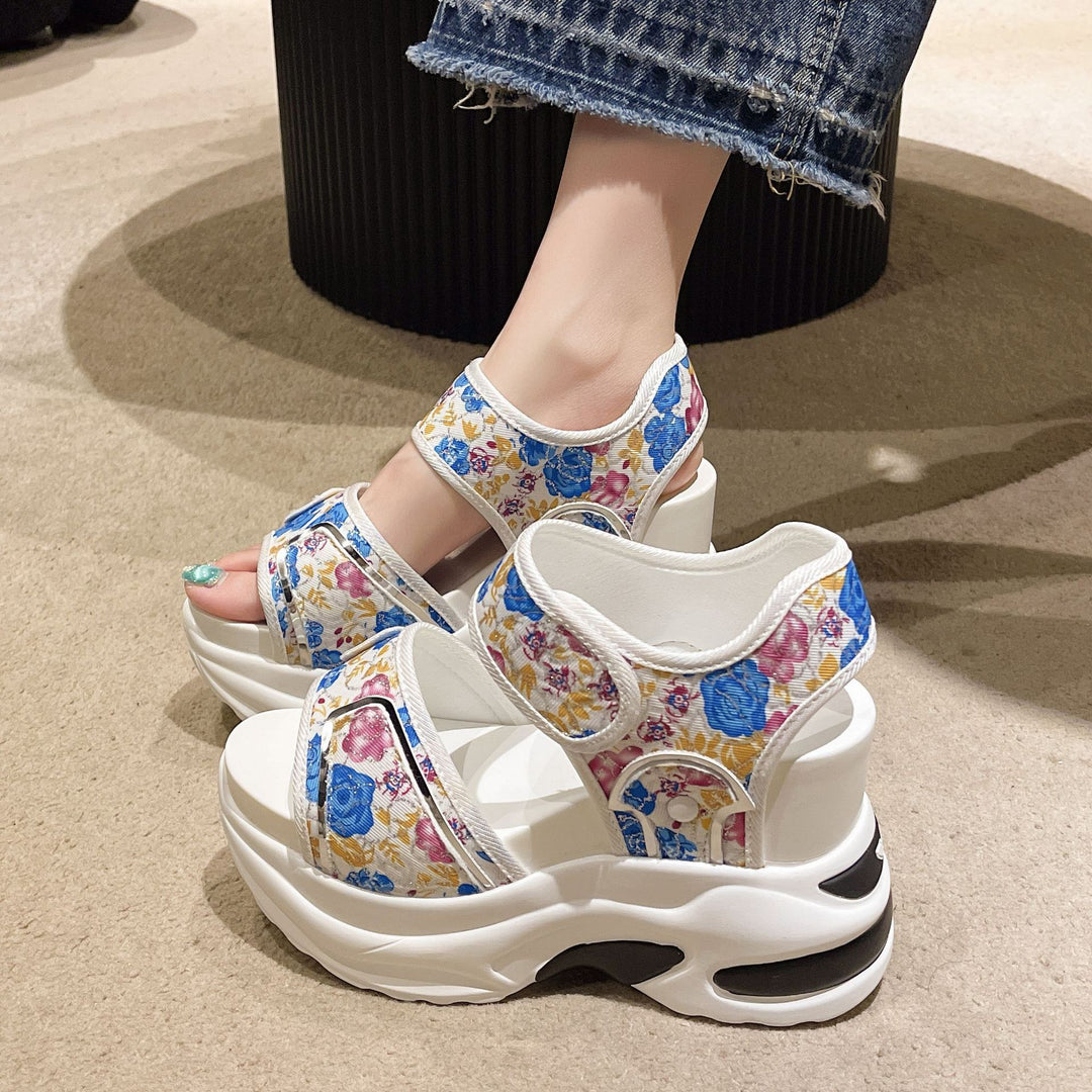 Women's chunky wedge heeled sandals with adjustable hook and loop straps and floral textile upper Mune Fashion