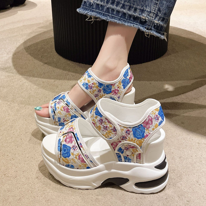 Women's chunky wedge heeled sandals with adjustable hook and loop straps and floral textile upper Mune Fashion