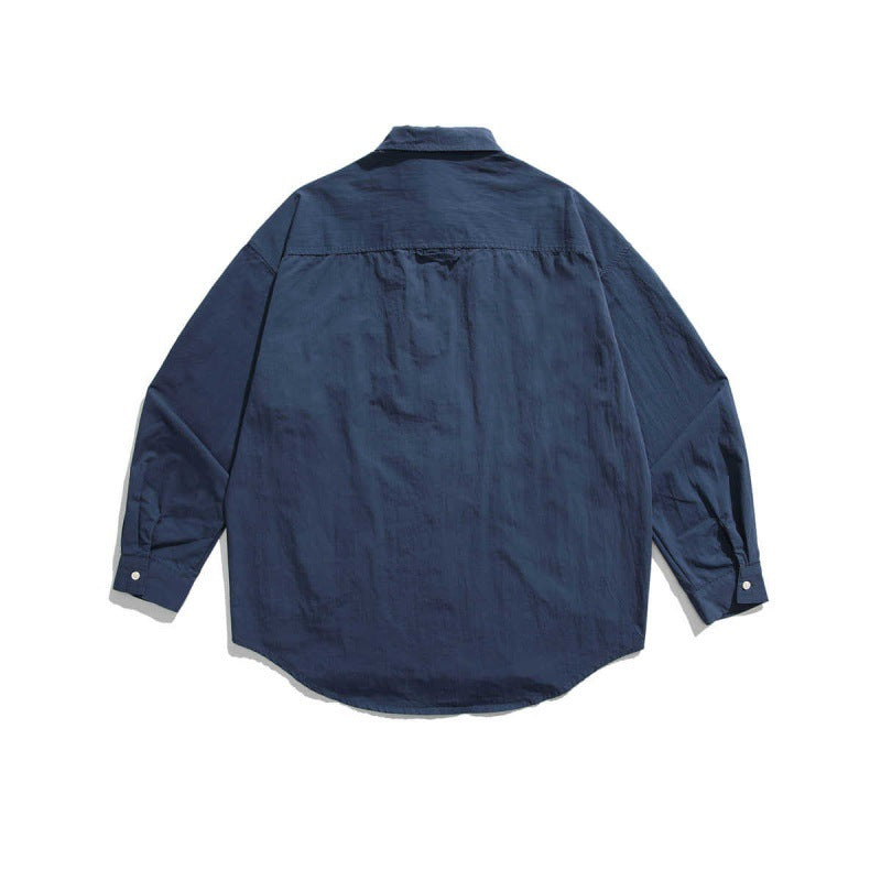 Unisex Boxy Overshirt Jacket with utility pockets, rounded hem, and oversized fit Mune Fashion